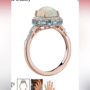 Gorgeous opal, blue topaz, and white sapphire ring in rose gold.  Size 7.